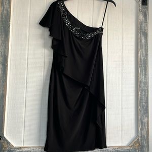 Betsy & Adam black dress. one shoulder and neckline embellishments. Size 4 NWOT